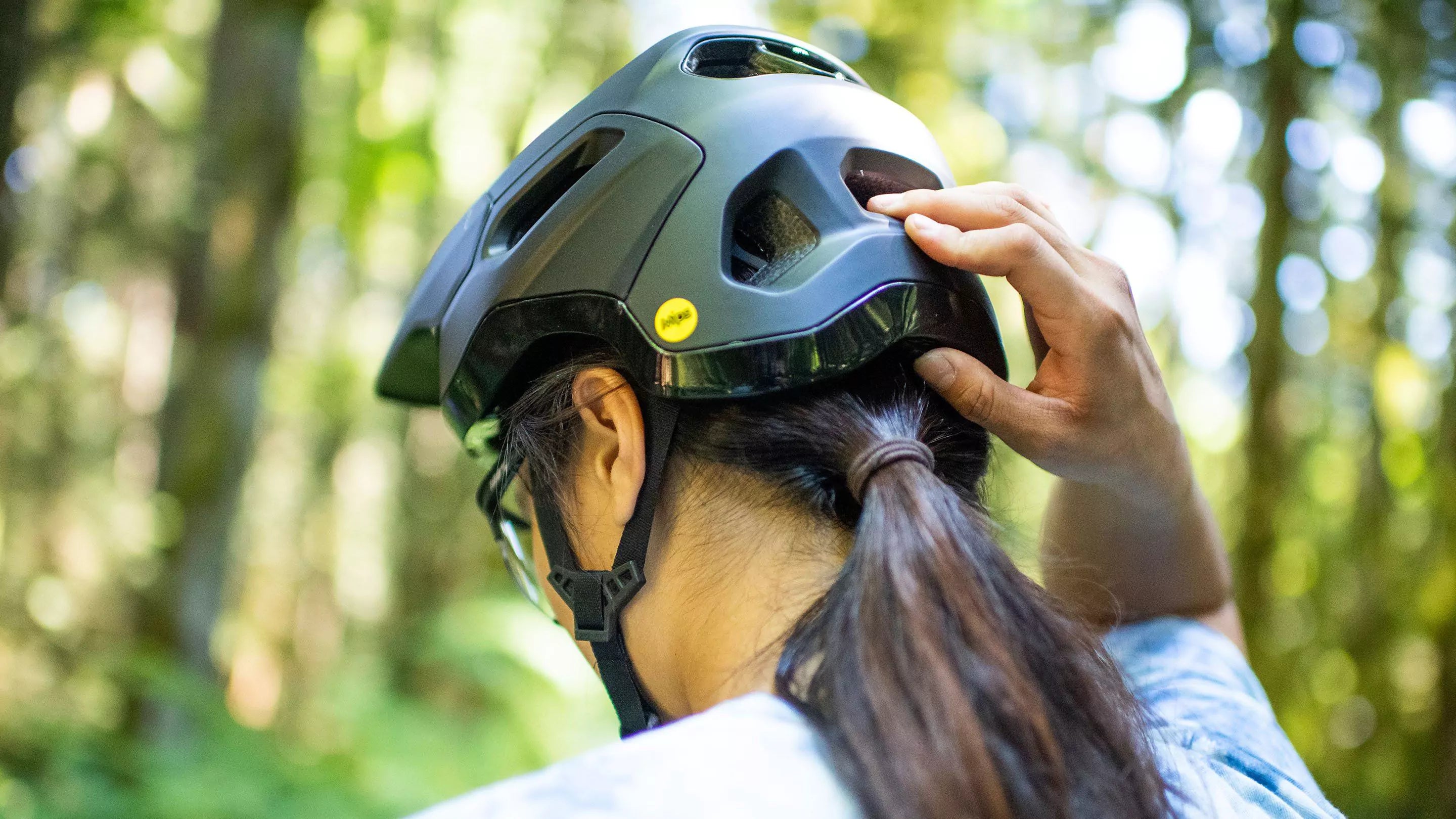 Woman in a bike helmet